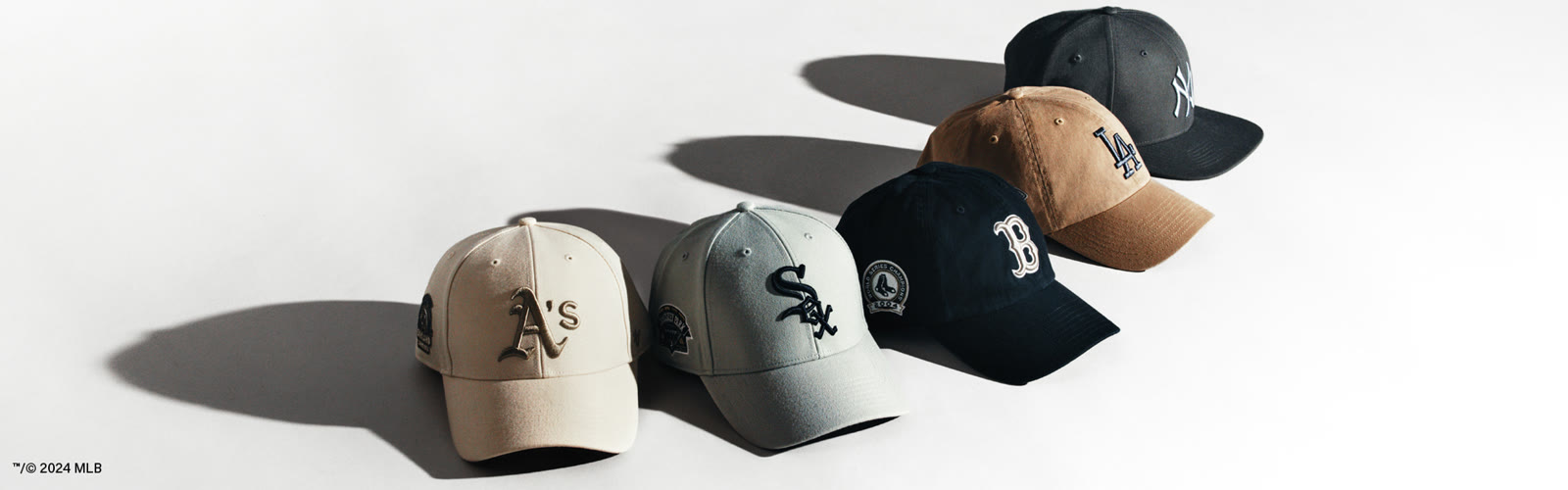 AW24 urban landscape with MLB caps