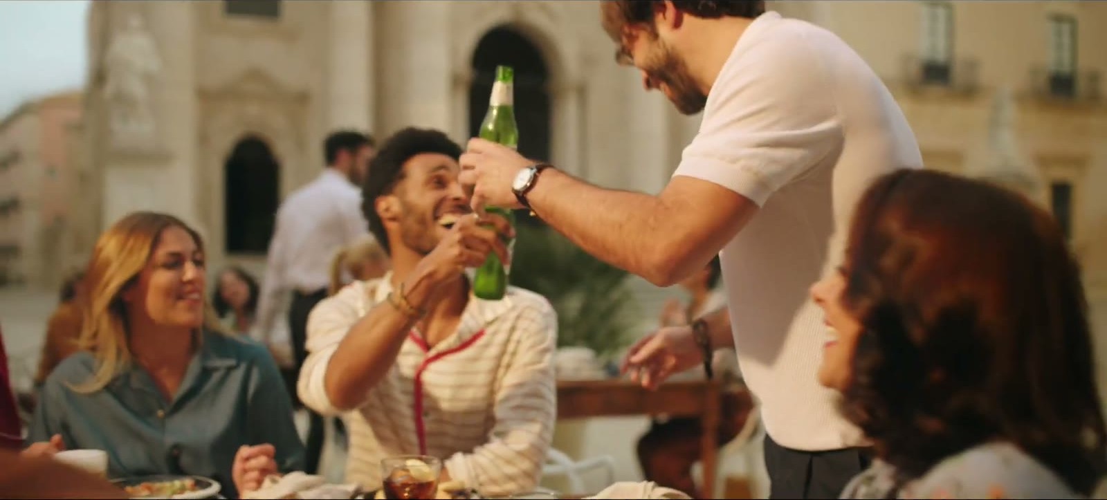 Still from Introducing Peroni 0.0: a table filling in the piazza