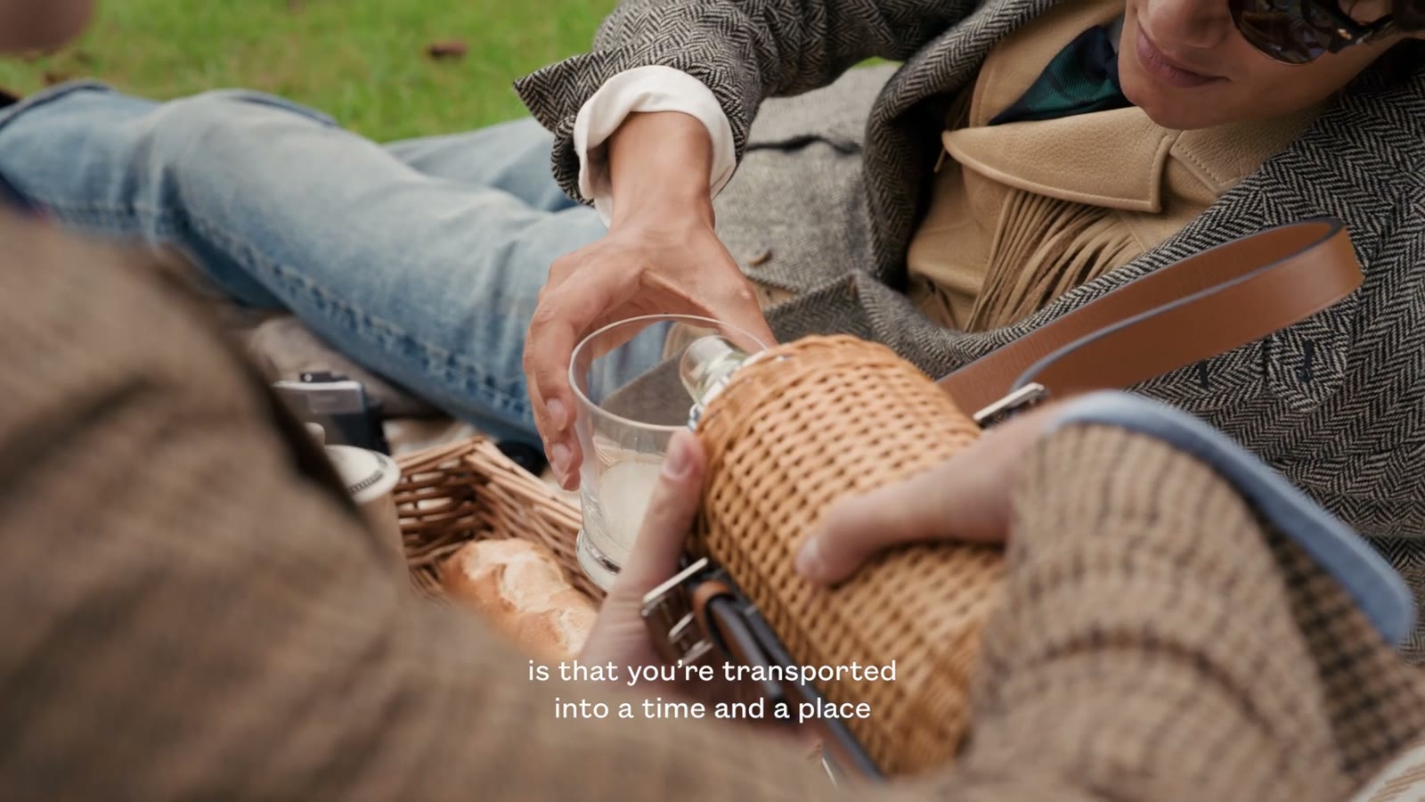 Still: the picnic hamper and driving gloves at the roadside